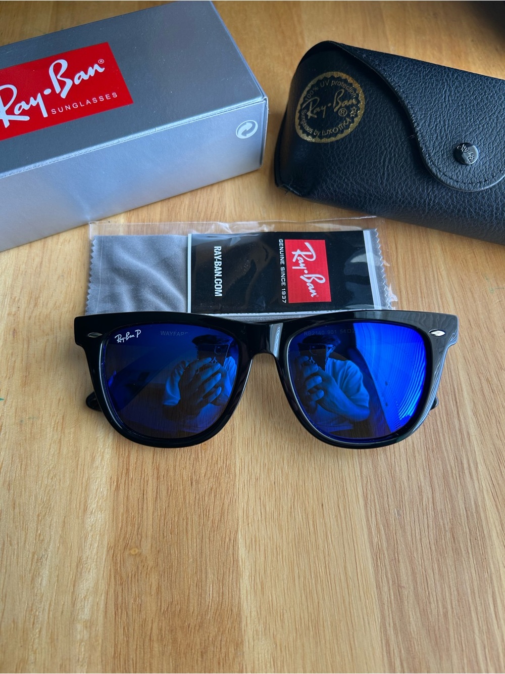Ray-Ban Black Frames with Blue Mirrored Lenses